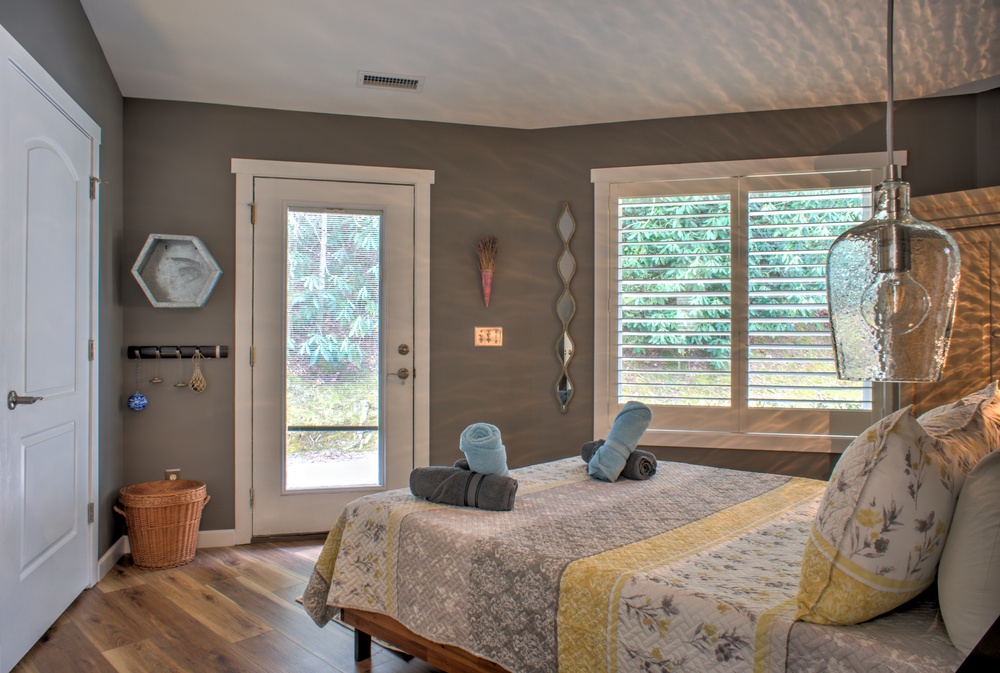 Bedroom One - Queen Bed, w/ Outdoor Access
