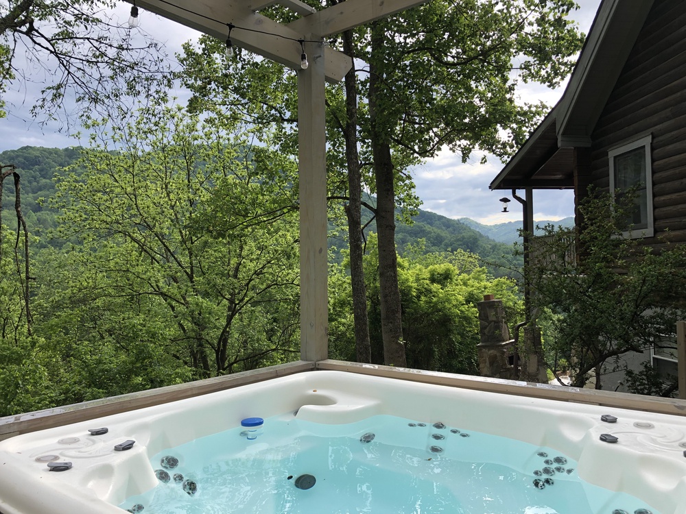 Soak Away the Stress in the Hot Tub while taking in the Mountain Views