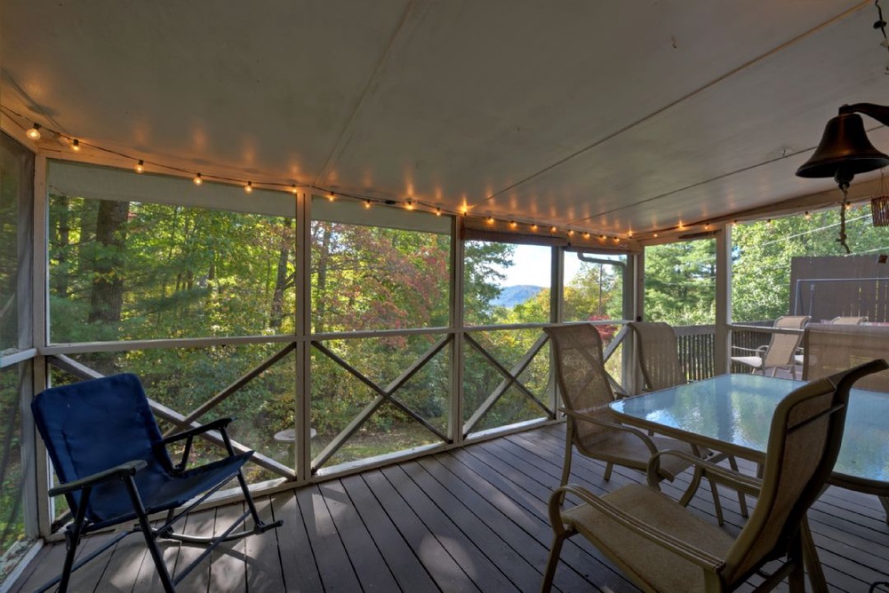 Screened Porch with Outdoor Dining Area