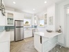 1st Floor Kitchen - Equipped with a Refrigerator & Ice Maker