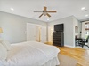 1st Floor Primary Suite - Furnished with a King Size Bed