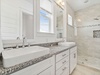 Guest En Suite Equipped with a Dual Vanity & Walk In Shower