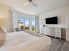 Primary King Suite - Balcony Access & a Flat-Screen TV