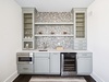 Conveniently Located Wet Bar Featuring Wine Cooler & Microwave