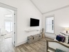 3rd Floor Sitting Area - Offering a Flat-Screen TV