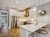 Updated Kitchen with Ample Counter Space and Bar Seating