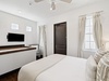Queen Suite - Balcony Access + Flat-Screen TV