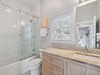 Convenient En-Suite with Single Vanity & Shower/Tub Combo