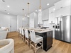 Spectacular lighting, beautiful floors, high-end appliances!
