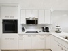 Fully Equipped Kitchen Offering Stainless Steel Appliances