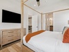 Primary King Suite - Equipped with a Flat-Screen TV