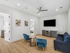 3rd Floor Living Area - Offering a Flat-Screen TV & Mini Fridge