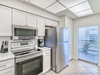 Kitchen - Equipped with Stainless Steel Appliances