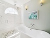 Primary King En-Suite - Soaking Tub + Walk-In Shower