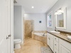 Primary King En-Suite - Oversized Soaking Tub + Walk-In Shower