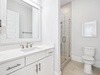 Primary King En-Suite - Single Vanity + Walk-In Shower