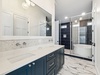 4th Floor Shared Bathroom - Dual Vanities + Expansive Walk-In Shower