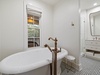 Primary Ensuite - Featuring a Walk-in Shower and Soaking Tub
