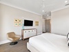 Primary King Suite - Balcony Access + Flat-Screen TV