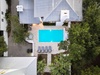Aerial View Showing Main House, Pool, and Carriage House