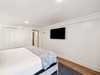 King Guest Suite - Equipped with a Flat-Screen TV & Patio Access