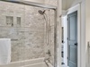 Guest Bathroom - Equipped with a Tub-Shower Combo & TV