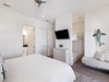 King Guest Suite - Balcony Access, Twin Bunk & Flat-Screen TV