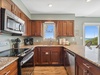Kitchen - Equipped with Stainless Steel Appliances