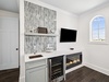 King Guest Suite - Wet Bar Featuring a Wine Cooler + Electric Fireplace & Flat-Screen TV