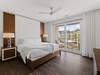 Primary King Suite - Private Balcony Access & Flat-Screen TV