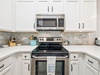 Chef's Kitchen Offering Stainless Steel Appliances