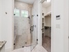 Primary King En-Suite - Walk-In Shower & Spacious Closet