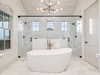 Relax & Unwind in the Oversized Soaking Tub + Expansive Walk-In Shower