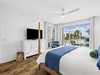 Primary King Suite - Balcony Access + Flat-Screen TV