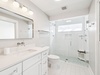 Primary King En-Suite - Single Vanity + Walk-In Shower