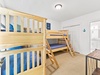 Additional First Floor Bunk Room with a Large Flat Screen TV