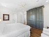 King Guest Suite — Spacious 3rd‑floor king bedroom with ample storage