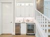 Fully Stocked Wet Bar Off the Kitchen - Stand-Alone Ice Maker + Wine Cooler