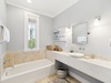 Primary King En-Suite - Single Vanity & Soaking Tub