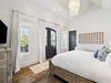 Primary King Suite - Private Balcony + Flat-Screen TV