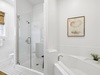 Primary King En-Suite - Soaking Tub + Walk-In Shower