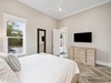 Primary King Suite - Equipped with a Flat-Screen TV