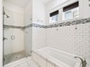 Primary King En-Suite - Soaking Tub + Walk-In Shower