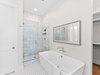 Enjoy the Soaking Tub & Walk-In Shower in the Primary En-Suite