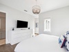 Front Primary King Suite - Equipped with a Flat-Screen TV