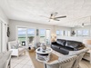 Cozy Living Area Offering Ample Seating & Wall to Wall Gulf Views