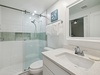Queen Guest En-Suite - Single Vanity, Walk-In Shower & Hallway Access