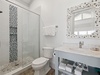 Primary King En-Suite - Single Vanity + Walk-In Shower