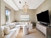 Family Room with Ample Seating & Large Flat-Screen TV