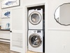 Stack Washer & Dryer Located in the Laundry Area